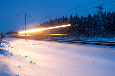 Cruising in the dark night of the passenger trainの写真素材