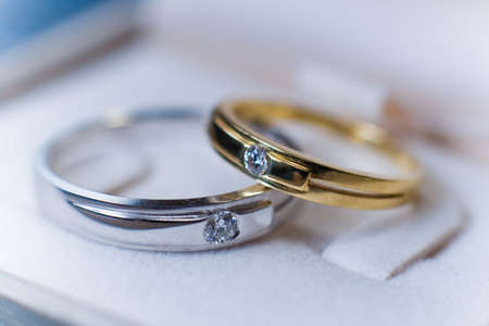 Two wedding rings - golden and platinum onesの写真素材