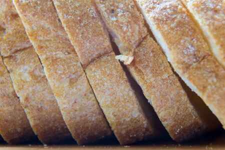 white loaf from the side close-up crust