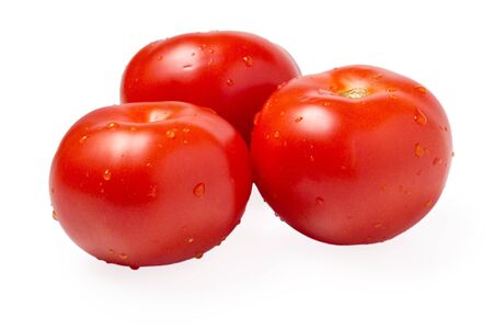 three red tomatoes isolated on white backgroundの写真素材