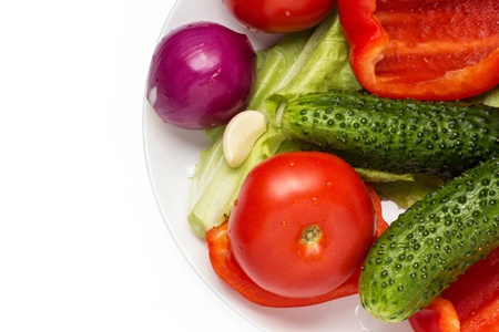 part plate with vegetables isolated on white backgroundの写真素材