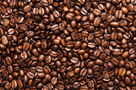 roated coffee beans, can be used as a backgroundの写真素材