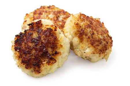 three fish cakes from cod isolated on white