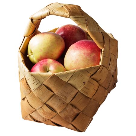 basket of fresh apples isolated on white backgroundの写真素材