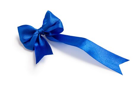 Festive blue bow made of ribbon isolated on whiteの写真素材