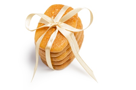 gift aromatic candles in stack with bow isolated on whiteの写真素材
