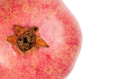 big ripe pomegranate isolated on white backgroundの写真素材