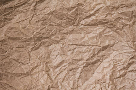 brown crumpled paper texture, can be used as a backgroundの写真素材