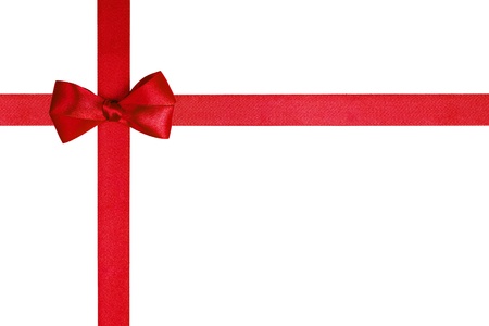 composition with red ribbons and a simple bow isolated on whiteの写真素材
