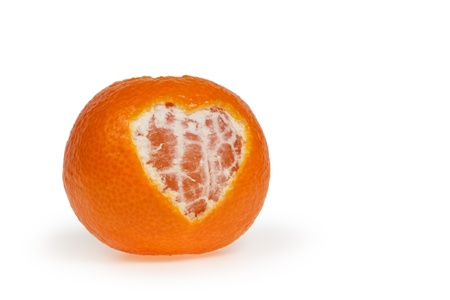 tangerine with heart symbol isolated on whiteの写真素材