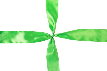 green ribbon cross, isolated on white backgroundの写真素材
