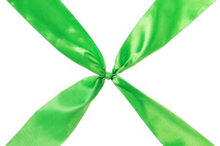 green ribbon cross, isolated on white backgroundの写真素材