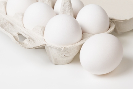 detail photo of open container with eggs, space for textの写真素材