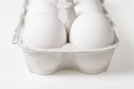 detail photo of open container with eggs, can be used as a backgroundの写真素材