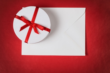 background with gift box and envelope, space for textの写真素材