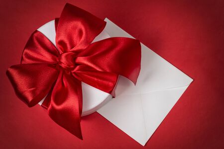 background with gift box and envelope, space for textの写真素材