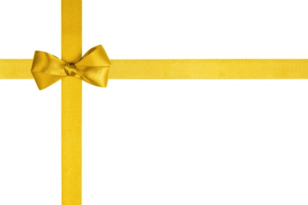 composition with yellow ribbons and a simple bow isolated on whiteの写真素材