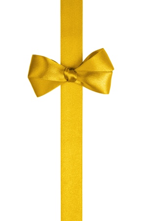 yellow ribbon with simple bow isolated on white backgroundの写真素材