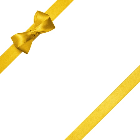 yellow ribbons with simple bow isolated on white backgroundの写真素材