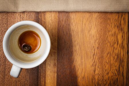 espresso cup on wood surface with spaceの写真素材