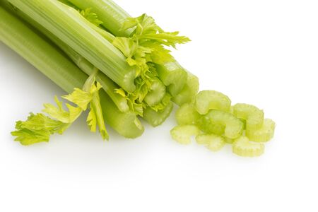 sliced fresh celery isolated on white backgroundの写真素材
