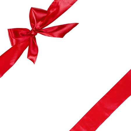 red ribbon with bow, square composition isolated on white backgroundの写真素材