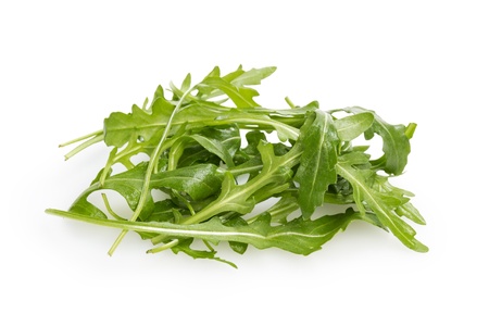 fresh rucola leaves, isolated on whiteの写真素材
