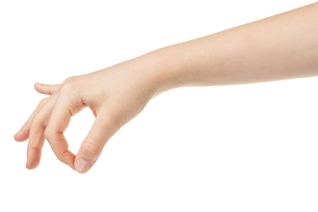 female teen hand holding something, isolated on whiteの写真素材