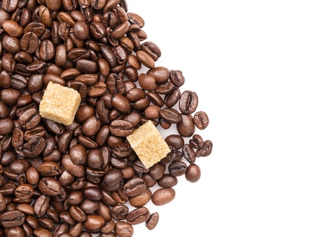 heap of coffee beans on burlap, white backgroundの写真素材