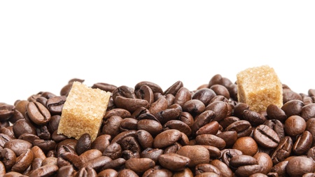 heap of coffee beans on burlap, white backgroundの写真素材