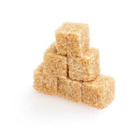 heap of sugarcane blocks, isolated on white backgroundの写真素材