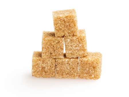 heap of sugarcane blocks, isolated on white backgroundの写真素材