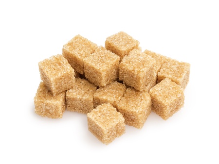 heap of sugarcane blocks, isolated on white backgroundの写真素材