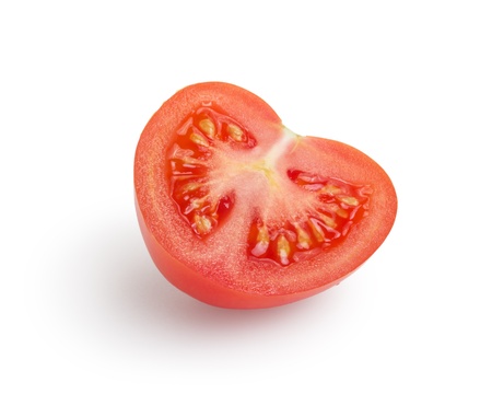 half of tomato, isolated on whiteの写真素材