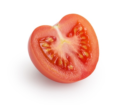 half of tomato, isolated on whiteの写真素材