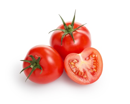 fresh tomatoes one half, isolated on whiteの写真素材