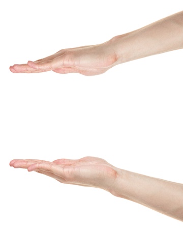adult male hands measuring something, isolated on whiteの写真素材
