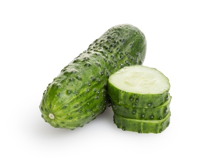 greenhouse cucumber with slices, isolated on whiteの写真素材