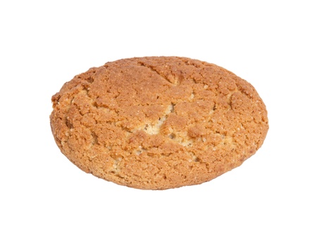 single oat cookie, isolated on white backgroundの写真素材