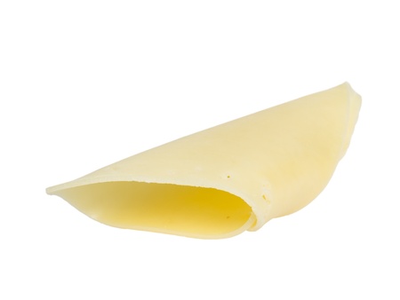 folded slice of edam cheese, isolated on whiteの写真素材