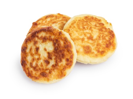 delicious traditional cheese pancakes, isolated on whiteの写真素材