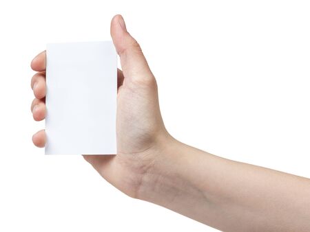 female teen hand holding blank paper card, isolated on whiteの写真素材