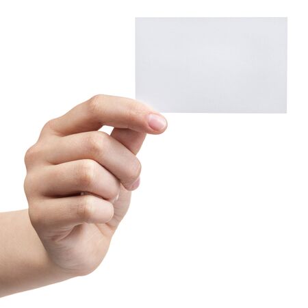 female teen hand holding blank visiting card, isolated on whiteの写真素材