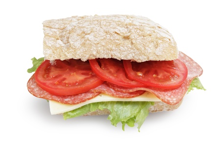 big sandwich with salami cheese tomato and salad leaves on ciabatta bread, isolatedの写真素材