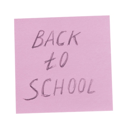 back to school text on reminder paper, isolated on whiteの写真素材