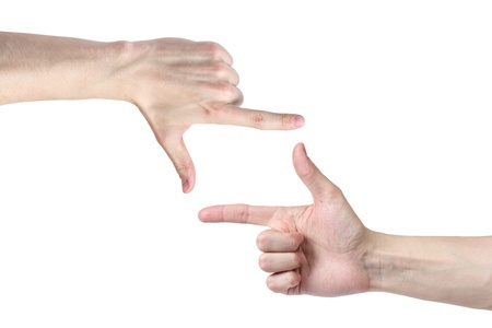 adult man hands framing something, isolated on whiteの写真素材