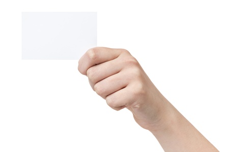 female teen hand showing blank paper card, isolated on whiteの写真素材