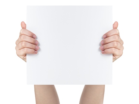 two female teen hands showing blank paper sheet, isolated on whiteの写真素材