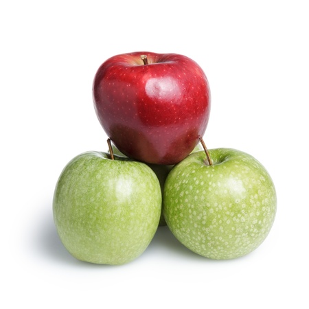 one red and three green apples in piramid, leader on topの写真素材