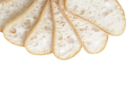 border from slices of fresh italian ciabatta bread, isolated on whiteの写真素材